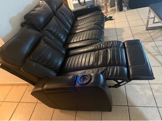 Black Learher recliner couches n center tables for sale