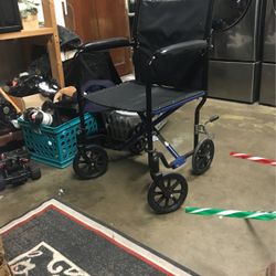 Wheelchair With Foot Holdings