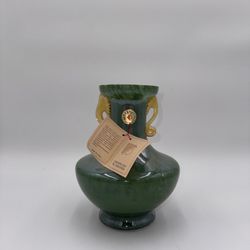 This is a Murano glass vase with Art Deco influences.