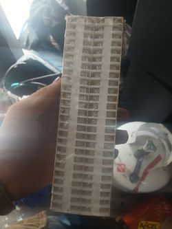 strip of modular electrical terminal blocks, similar to an Allen Bradley 1492-F1 multi-block pack or carrier.
• Type: Single-circuit or modular termin
