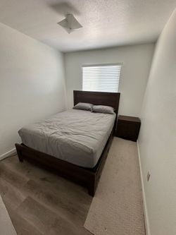 Queen bed set with pillow top mattress and box spring