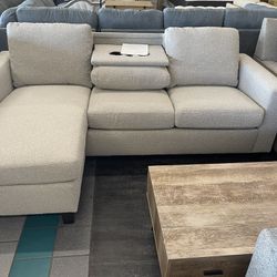 Sofa With Reversible Chaise And Drop Down Table On Sale
