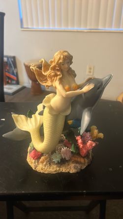 vintage polyresin mermaid and dolphin figurine.