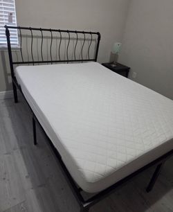 Bed with frame and mattress