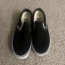 Brand new Class Slip On Black and White Vans (Mens 7.0/Women's 8.5)