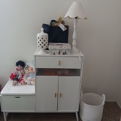 Cabinet with drawer, sm storage under little seat. Includes Remote 