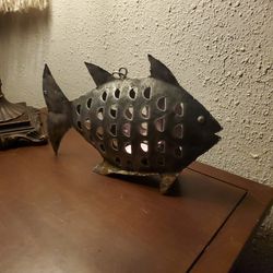 Metallic abstract fish skeleton candle holder