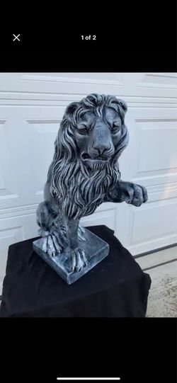 Large stone colored lion statue