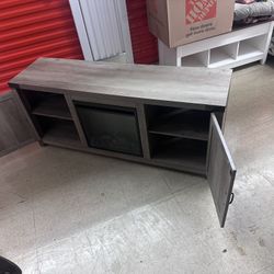 Tv stand with electric fireplace