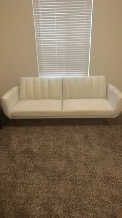 Cream futon for sale - decent condition