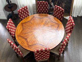 (Theodore Alexander 70” Round Wood Dining Table with 8 Upholstered Chairs