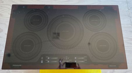 Induction cooktop.  Has a crack. Never used