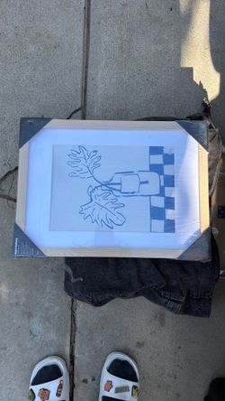 9 Wooden frames with art