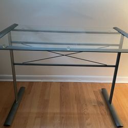 2 Glass Desk Tables and 2 Desk Chairs. Brand new condition. 