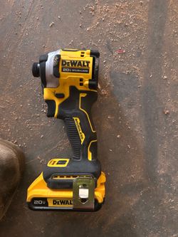 DeWalt 20V MAX ATOMIC 1/4 in. Cordless Brushless 3- Speed Impact Driver and battery