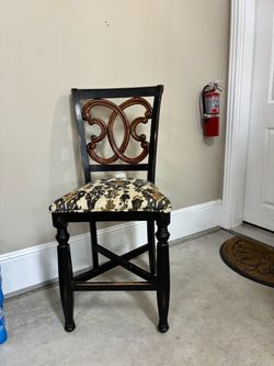 4 Unique black and brown distressed barstools , counter height