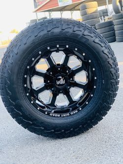 17” gloss black new rims and Falken off road At3w tires 6 lug. 2657017