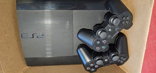 Playstation PS3 slim, 2 controllers, 15 games, BlyRay player.