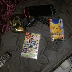 Nintendo Switch with dock, games andd controllers
