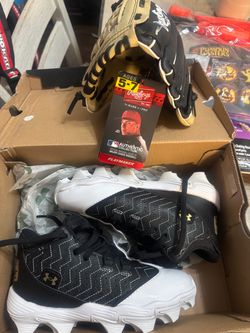 Left hand baseball glove and baseball cleats