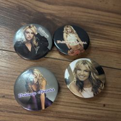 A vintage set of four (4) collectible Britney Spears pinback buttons