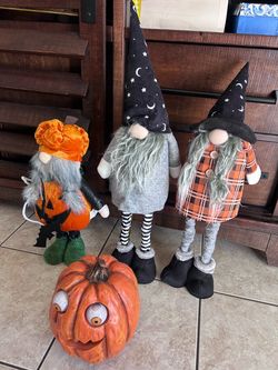 3 gnomes 17:26:27 in tall and 1 pumpkins 9 in