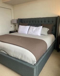 King Wingback Tufted Bed Frame – $1,000