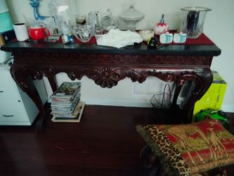 Cherry sofa table with marble/granite top.