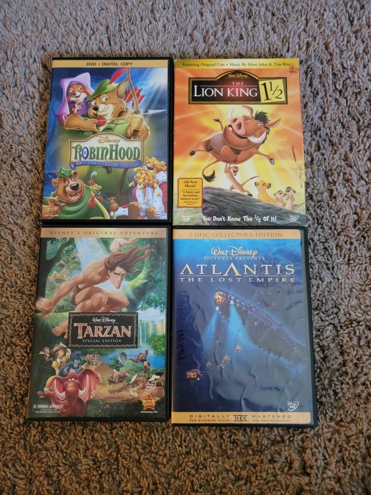 Robin Hood, Tarzan, Atlantis, & Lion King 1/2 DVDs