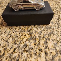 Porsche 718 Boxster S Aluminum Chrome model scale 1:43 Paperweight, new in box.