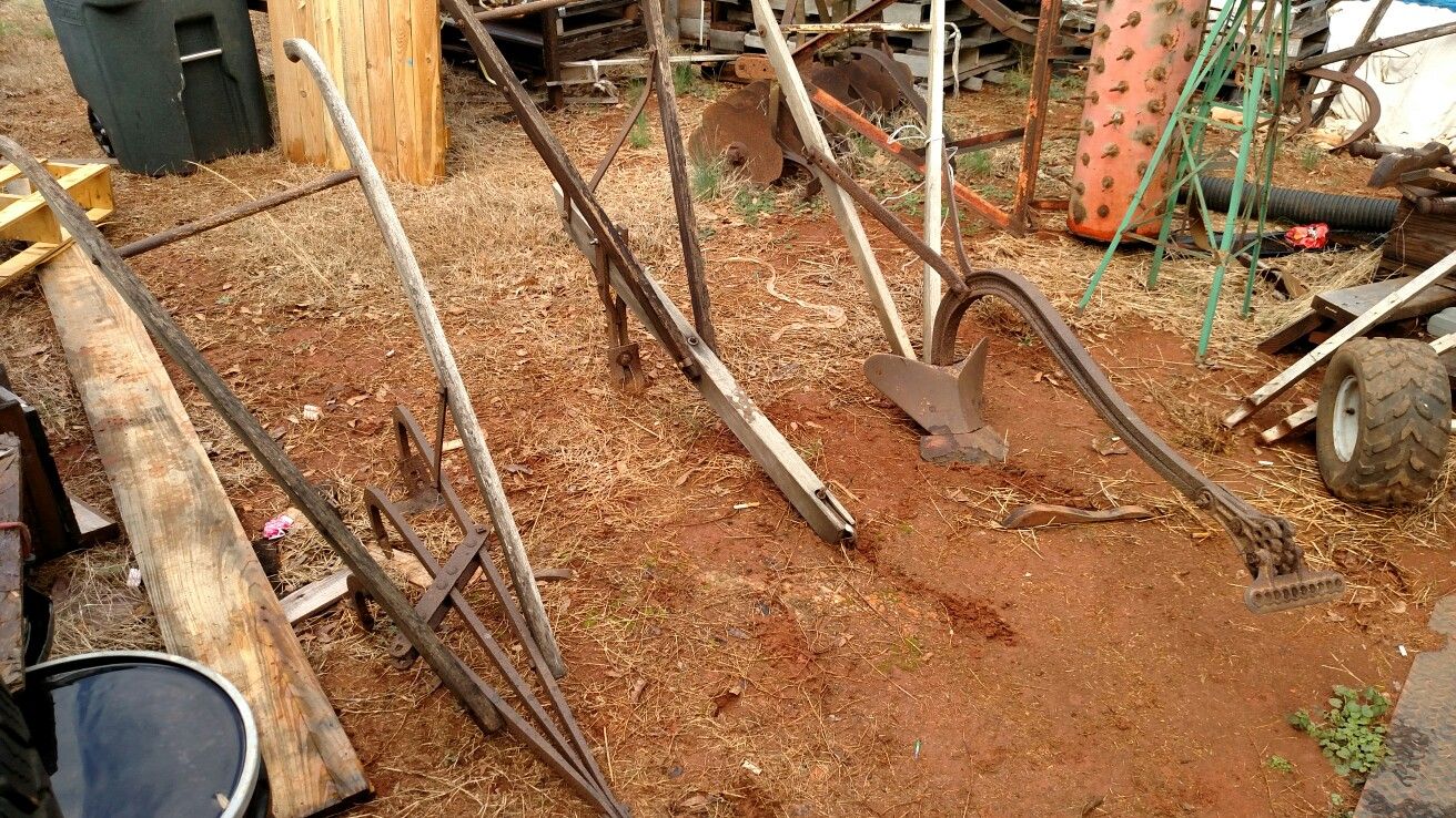Antique mule or horse drawn plows. Complete and in working condition
