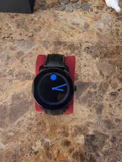 Movado watch in good condition with leather strap
