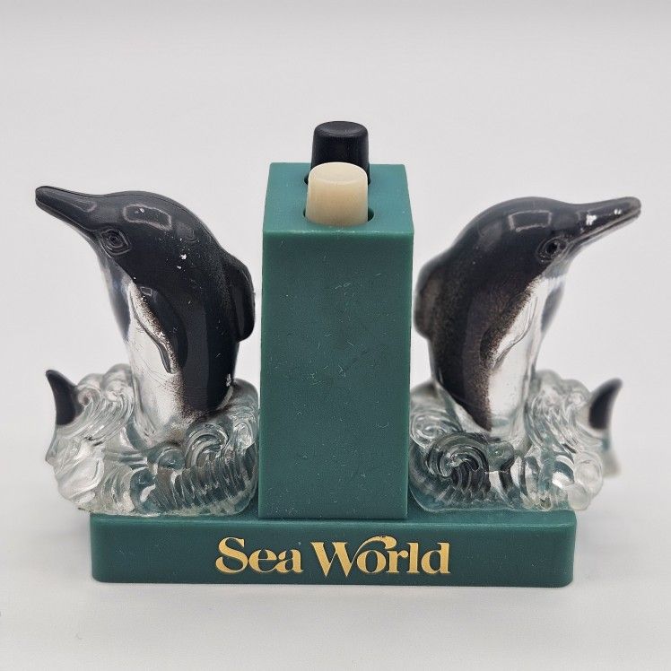 Vintage Sea World Dolphins Push Button Salt and Pepper Shakers Souvenir