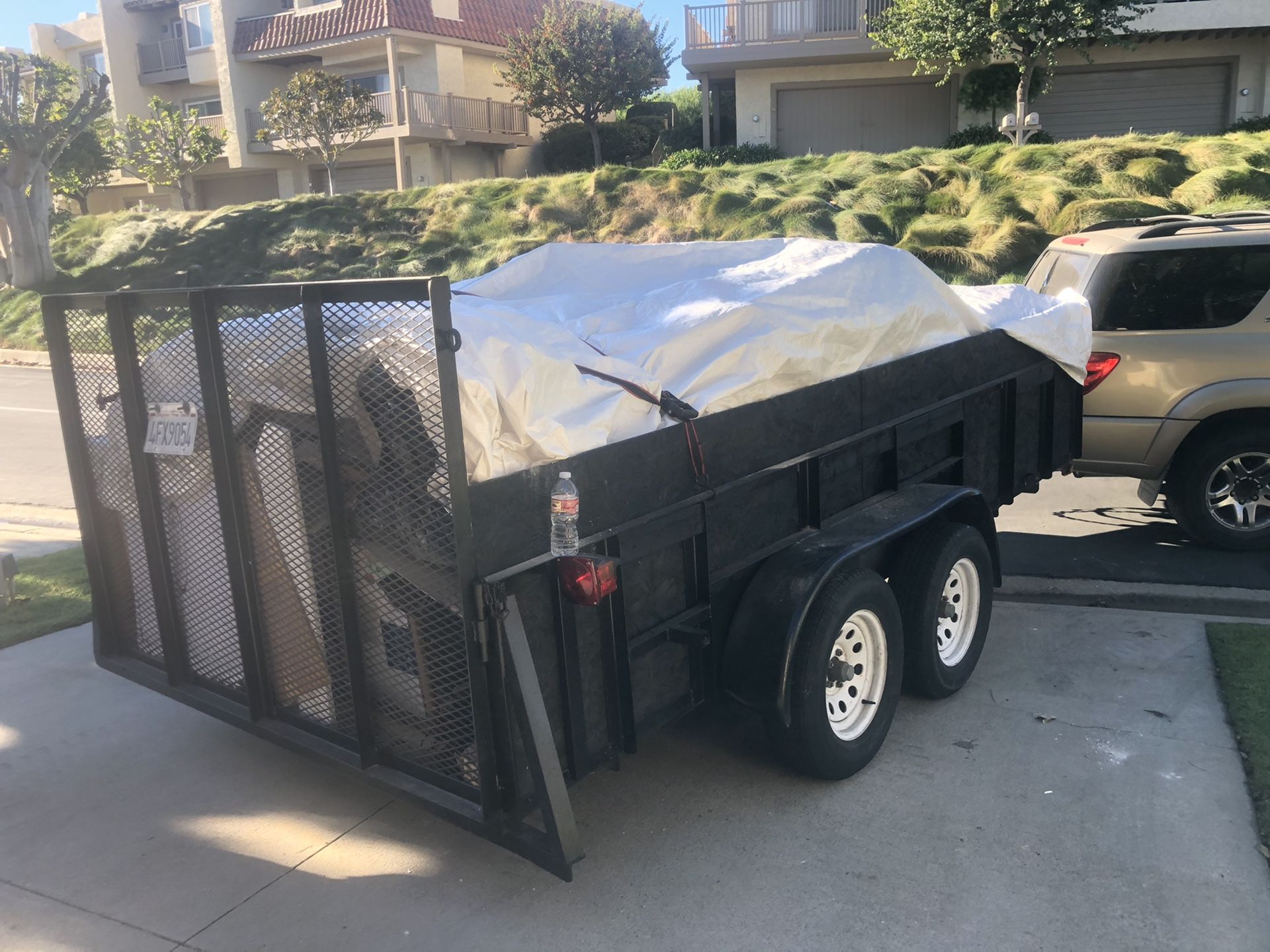 AZTEX trailer 2005 all paper work in Hand. Tags are up to date It’s a 6 FT - 7 inch X 14 FT long. 2 axles 6000lb capacity. Only serious