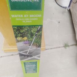 Water Jet Broom Attached To A Hose 