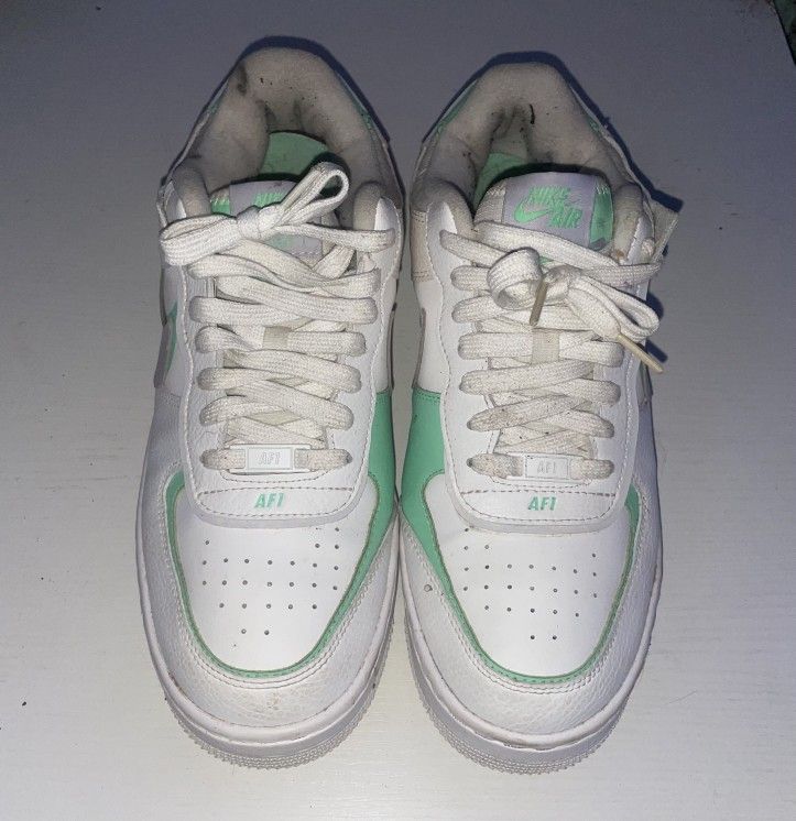 Nike Air Force size 9.5 for men or size 11 for women shoes