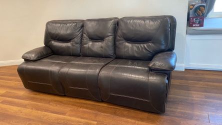 Black leather reclining couch