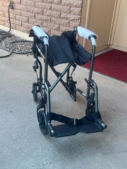 Wheelchair, New Transport, Folds Nicely, Footrests.