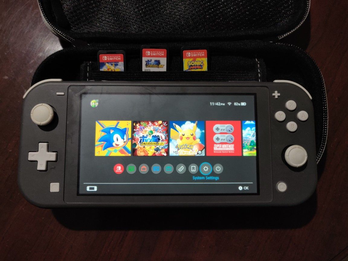 Nintendo Switch Lite CIB and 3 Games CIB