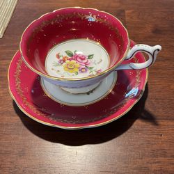 Teacup and saucer “by COALPORT “