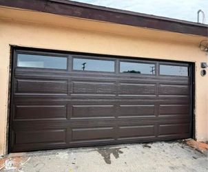Dark Brown Sectional Garage Door with Windows