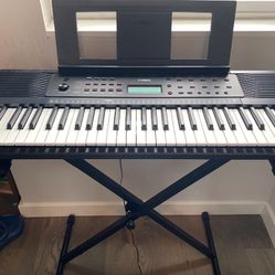 Yamaha, 61-Key PSR-E273 Portable Keyboard Piano (new, comes with power adapter and stand)