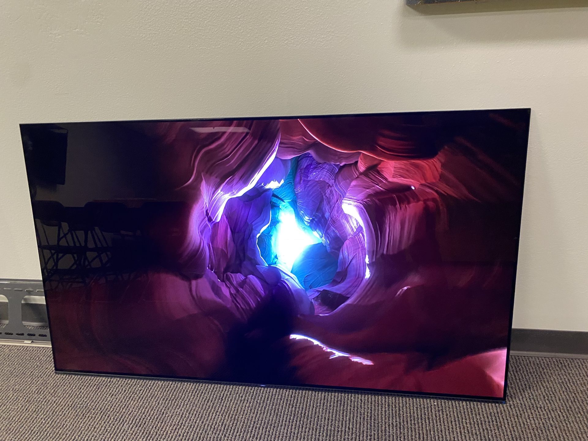 Sony XBR-65A9G 65-inch TV: MASTER Series BRAVIA OLED 4K Ultra HD Smart TV -HDR and Alexa w wall mount