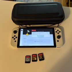 Nintendo Switch Oled And 3 Games