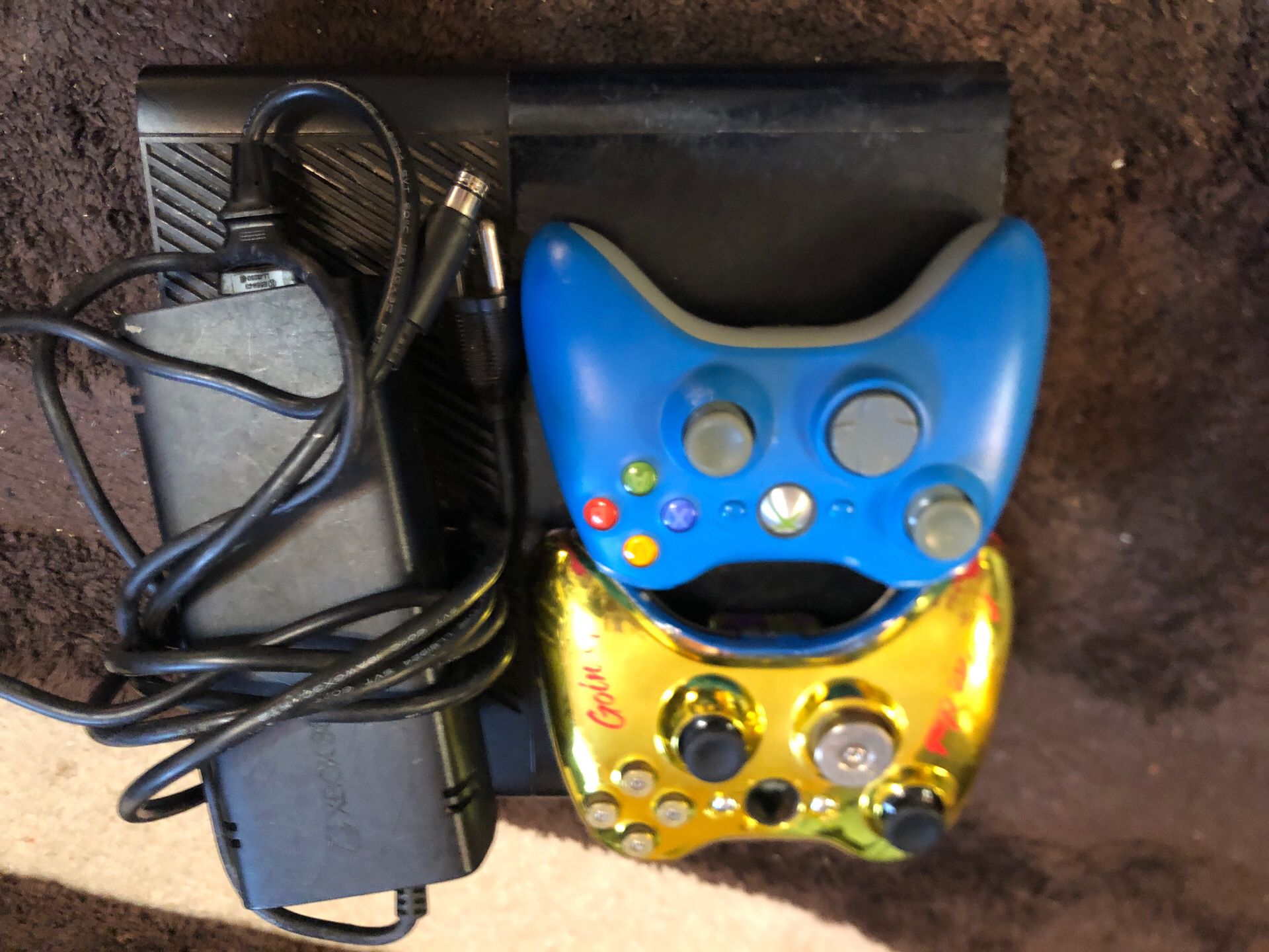 Xbox 360 with two controllers