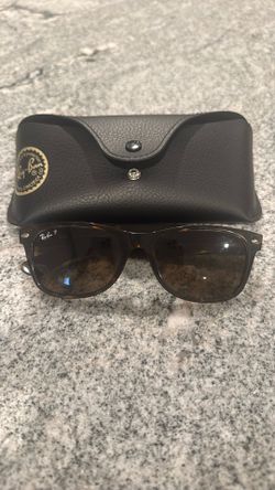 Rayban Wayfarers (one cracked lens) 