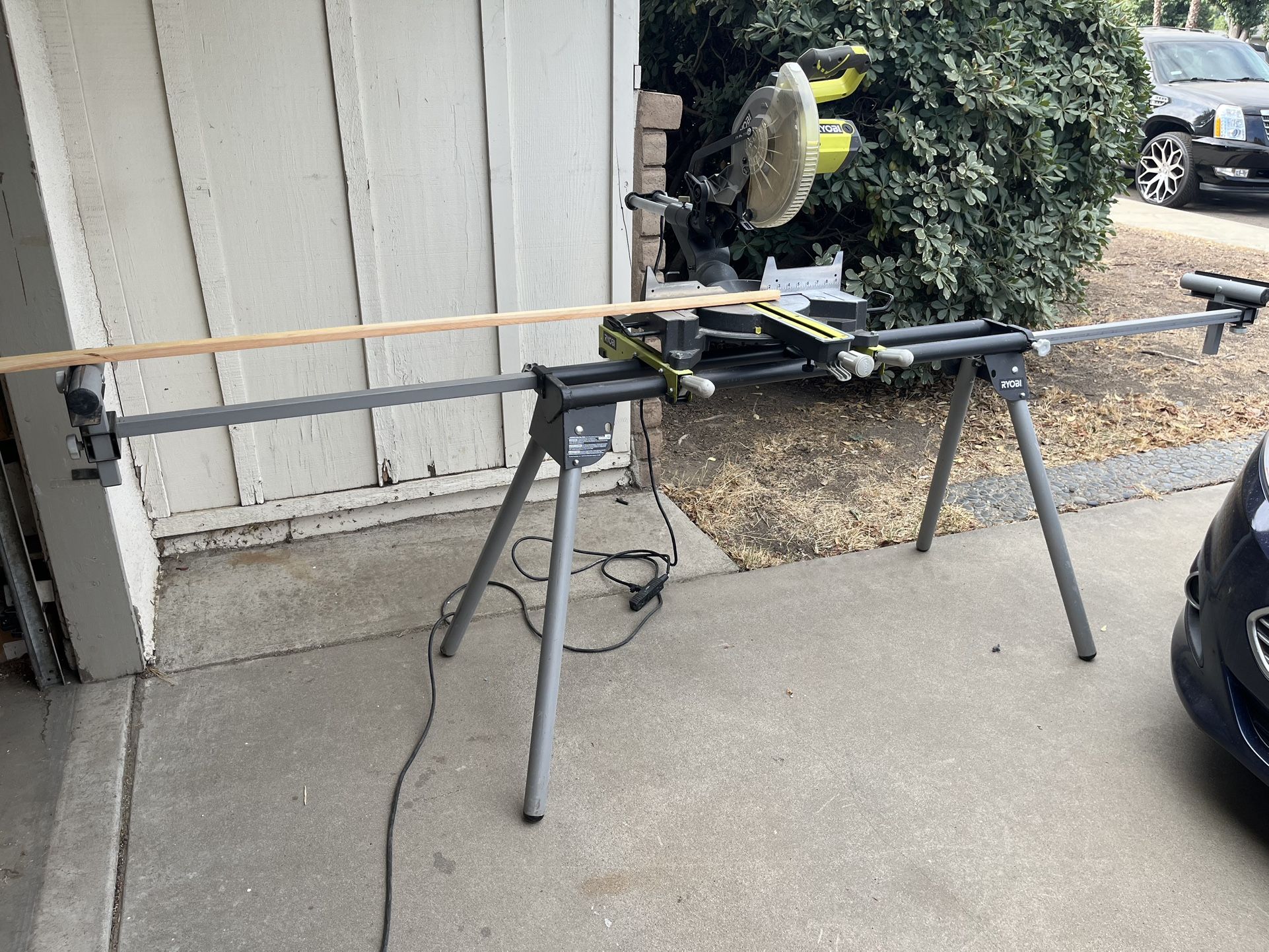10 ” MITER SAW RYOBI SLIDE WITH RYOBI STAND. $$190