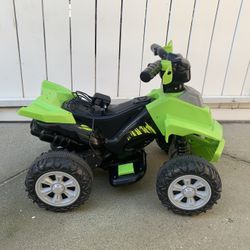 Kid’s Power Wheel Quad Riding Toy