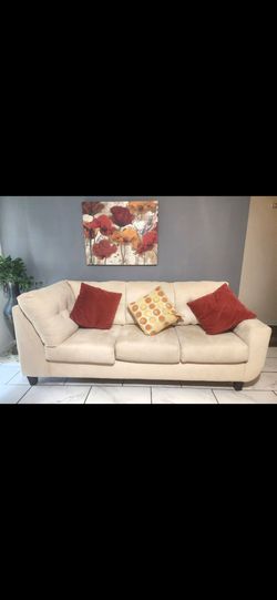 Beige sectional i have it separated because of space in room.
