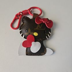 Upcycled with authentic LV material - Hello Kitty